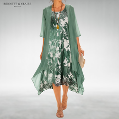 Green floral midi dress with sheer short-sleeve overlay, scoop neckline, flowing hem