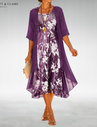 Purple floral midi dress with sheer short-sleeve overlay, scoop neckline, swirly hem