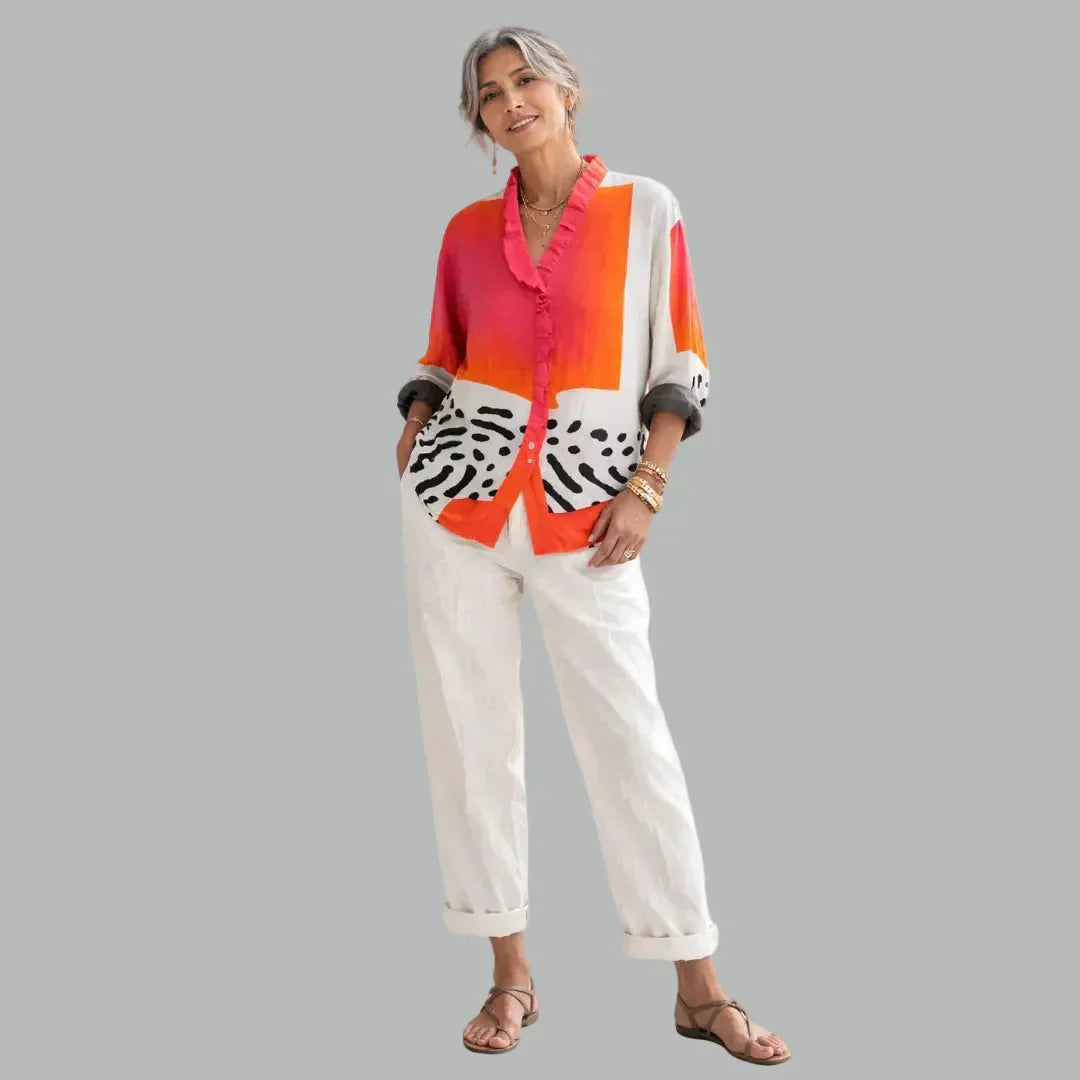 Ruby™ relaxed print blouse with ruffled button placket, long sleeves, red-orange and zebra