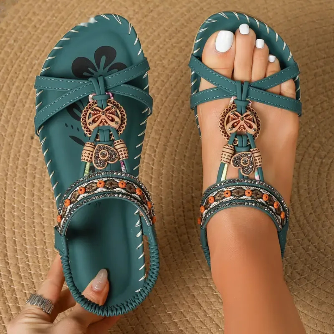 Boho comfort sandals in teal with bow ankle straps and ornate charm bead trim