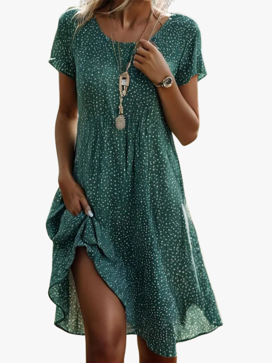 Green short-sleeve midi dress with white micro-dots, V-neck and side slit