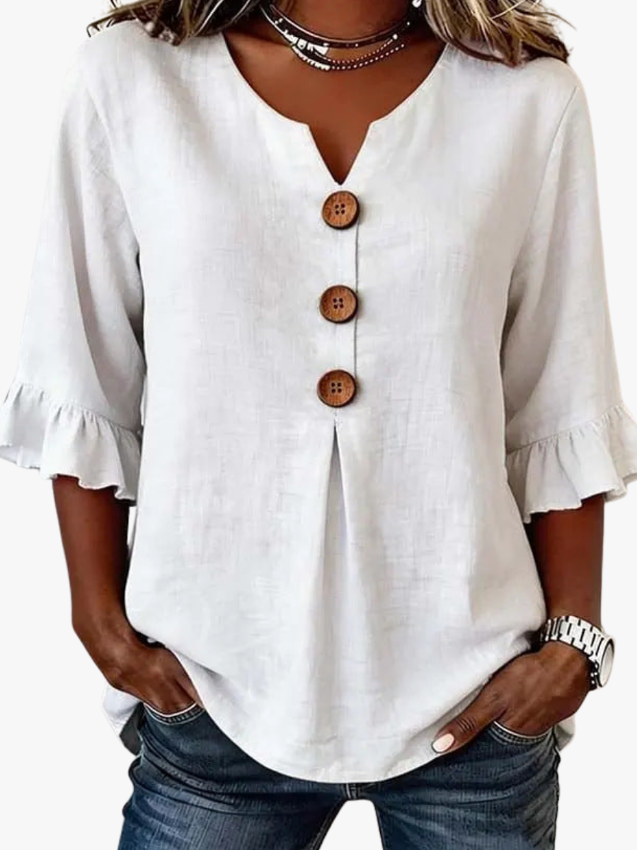 Women's white button-front blouse with ruffled sleeves and keyhole neckline