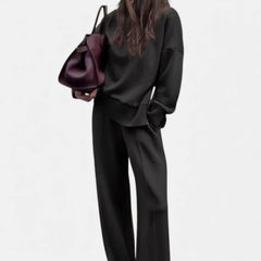 Women's black knit lounge set with pullover sweater and straight-leg pants