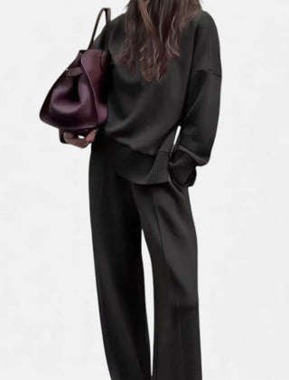 Women's black knit lounge set with pullover sweater and straight-leg pants