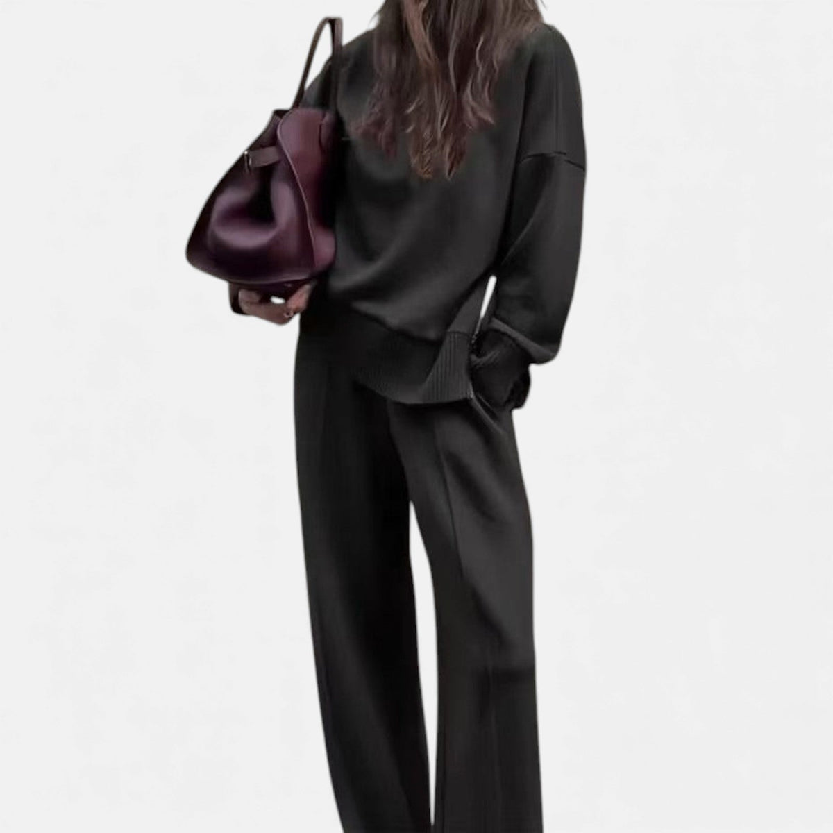 Women's black knit lounge set with pullover sweater and straight-leg pants