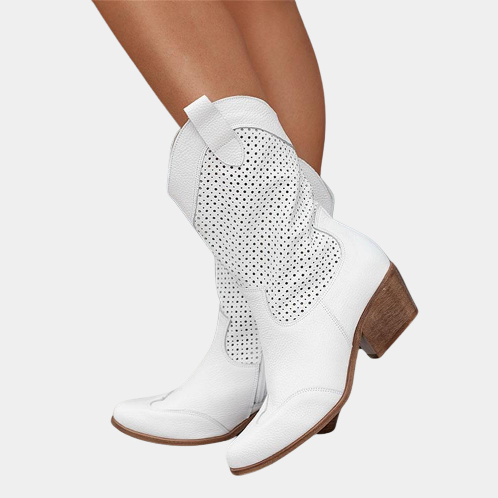 White cowboy-style orthopedic boots with perforated uppers and brown block heel
