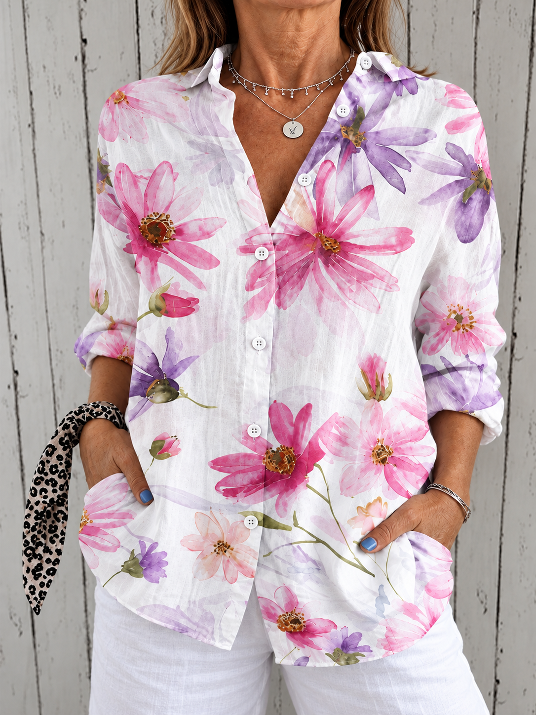 Women’s button-front floral blouse with 3/4 sleeves, pink and purple blossoms on white