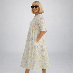 Midi floral dress in pale white with pastel floral print, 3/4 sleeves