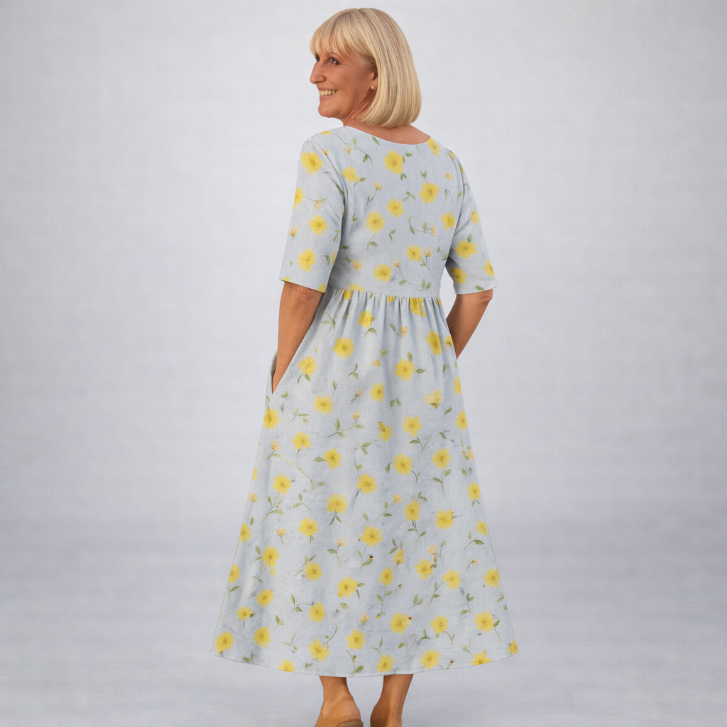 Midi floral dress in white with yellow daisy print, gathered waist, 3/4 sleeves