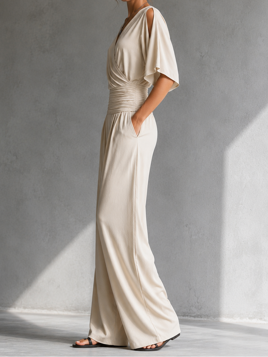 Beige wrap V-neck jumpsuit with flutter sleeves and ruched waist, wide-leg pants