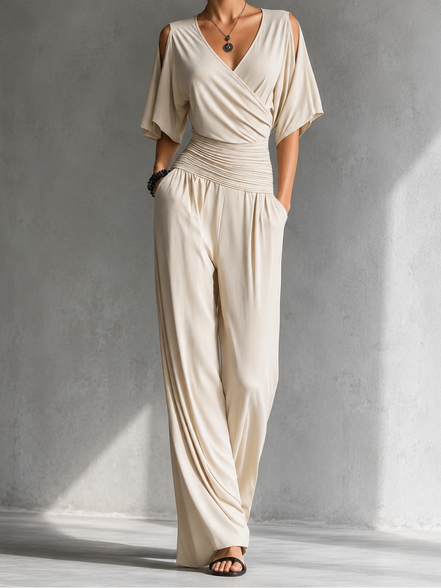 Beige wrap V-neck jumpsuit with ruched waist, draped bodice, wide-leg pants