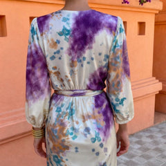 Back view watercolor print maxi dress with tie waist and long balloon sleeves.