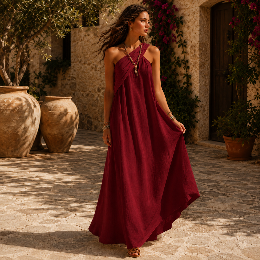 Burgundy cross-front maxi dress with halter straps and tassel pendant