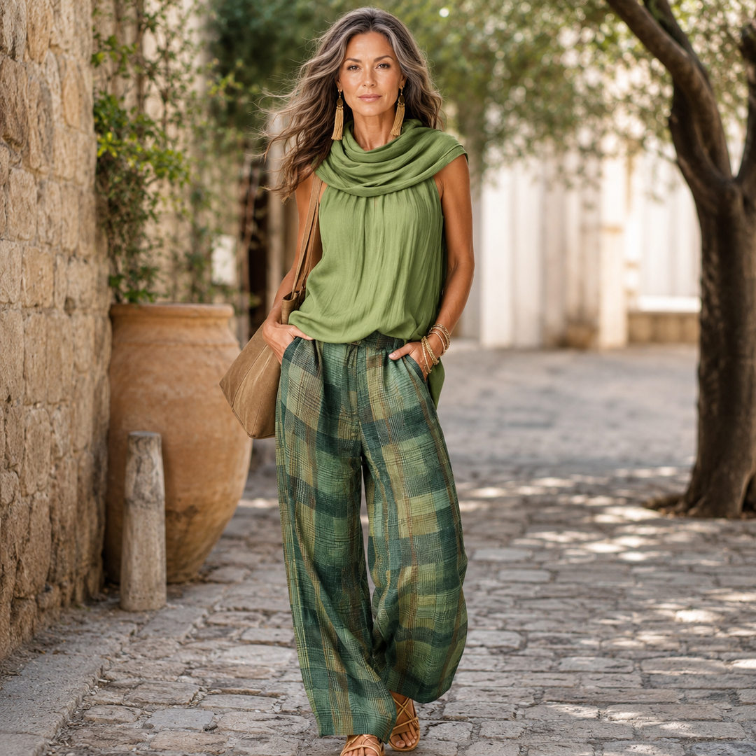 Relaxed set: sleeveless draped cowl-neck top and green plaid wide-leg trousers