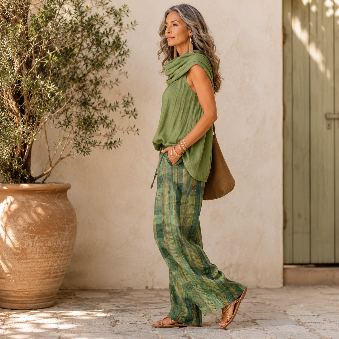 Relaxed set standing profile: sage green sleeveless top with green plaid wide-leg pants