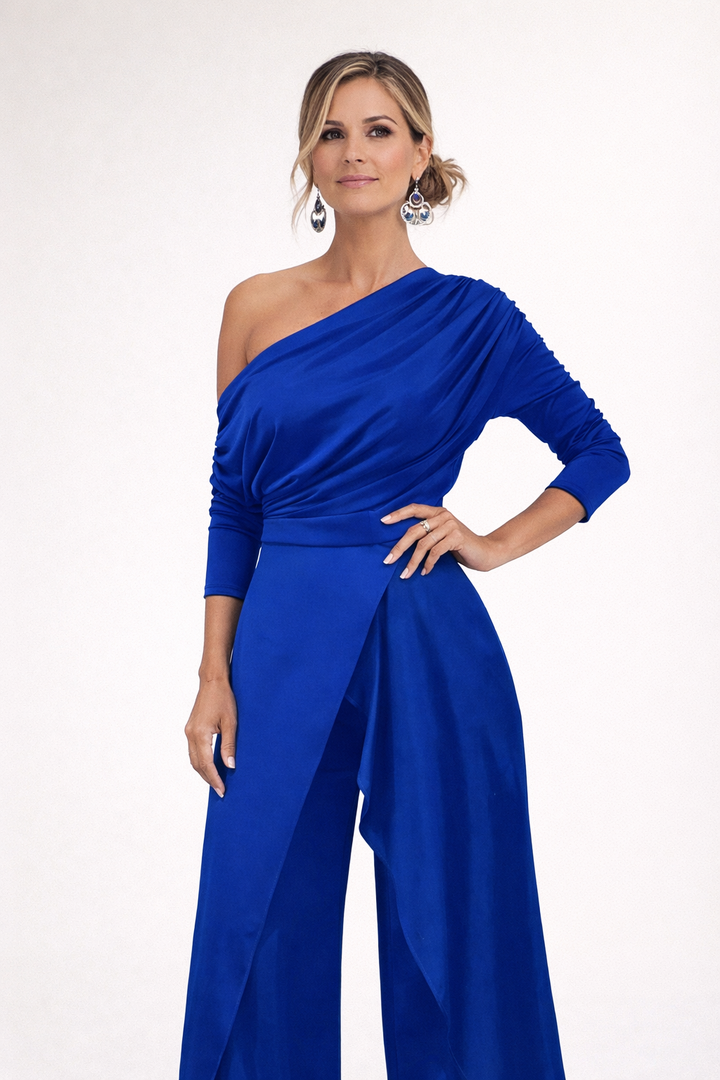 Royal blue off-shoulder draped jumpsuit with long sleeves and a wrap-style waist