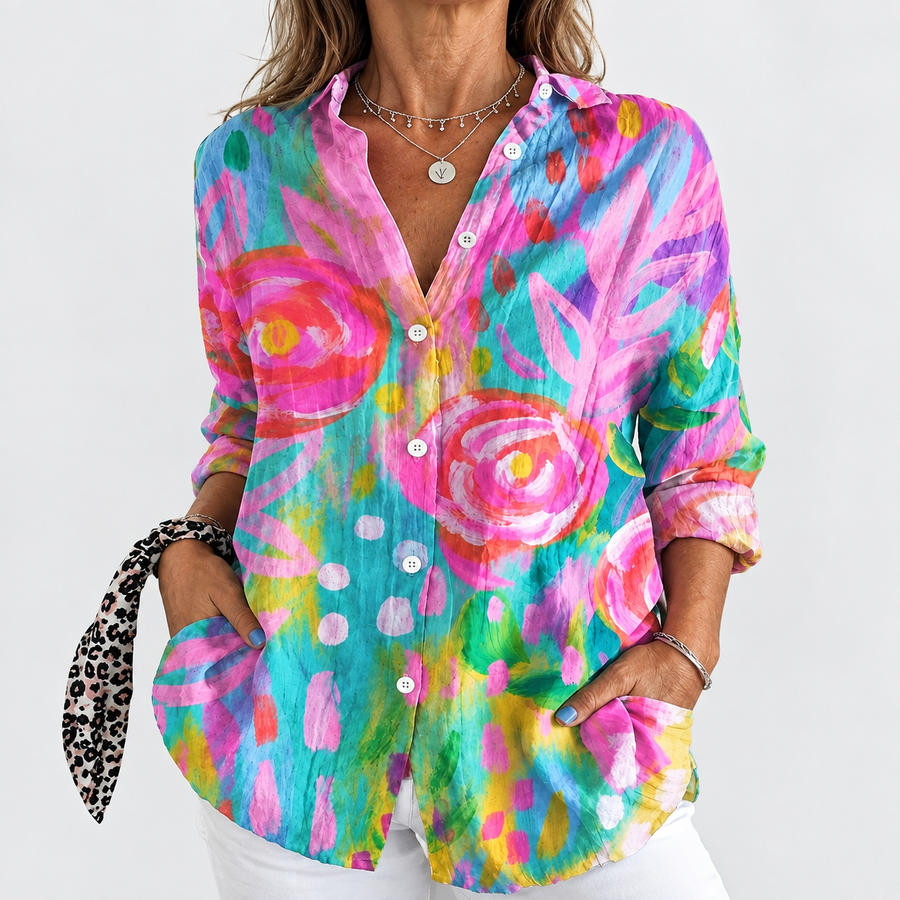 Floral button-up blouse with long sleeves, V-neck; colorful abstract blooms on teal