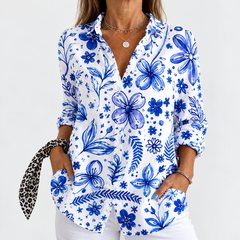 Floral button-up blouse with long sleeves, V-neck; blue flowers on white