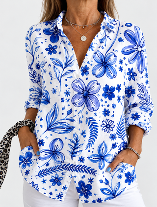 Floral button-up blouse with long sleeves, V-neck; blue flowers on white