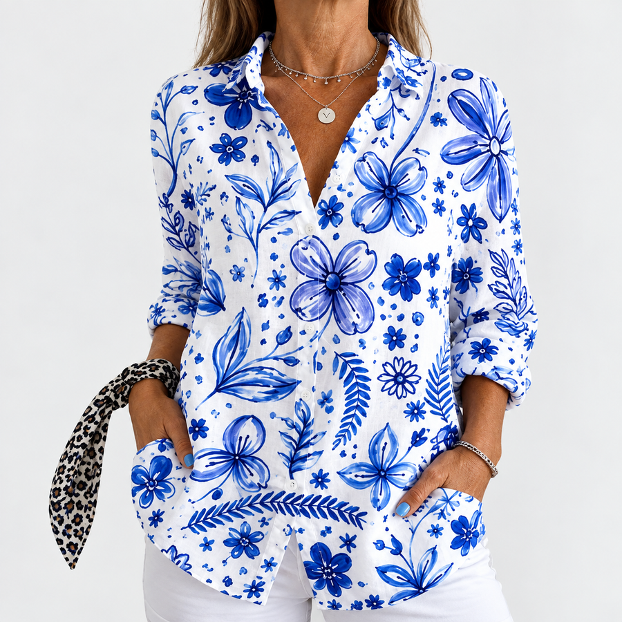 Floral button-up blouse with long sleeves, V-neck; blue flowers on white