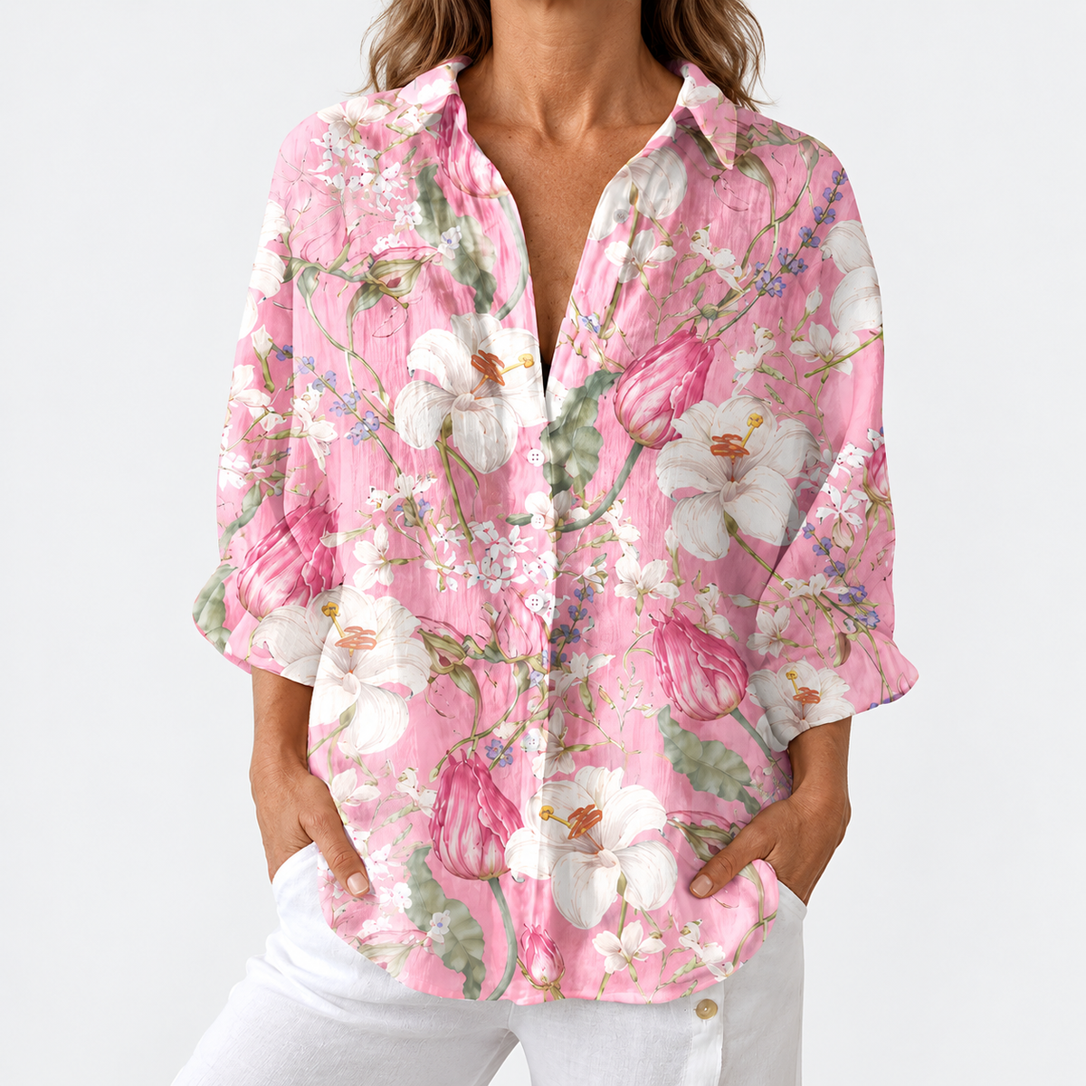 Pink floral V-neck blouse with 3/4 sleeves, button-front top