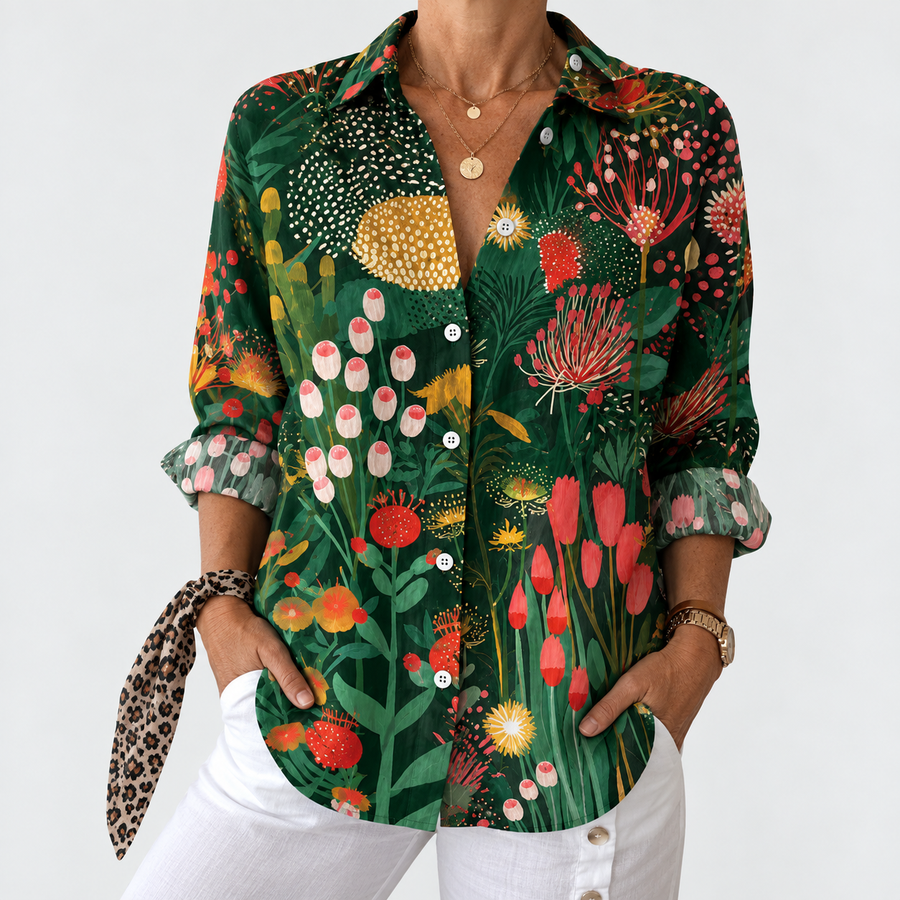 Emerald green botanical print button-up blouse with long sleeves and gathered cuffs