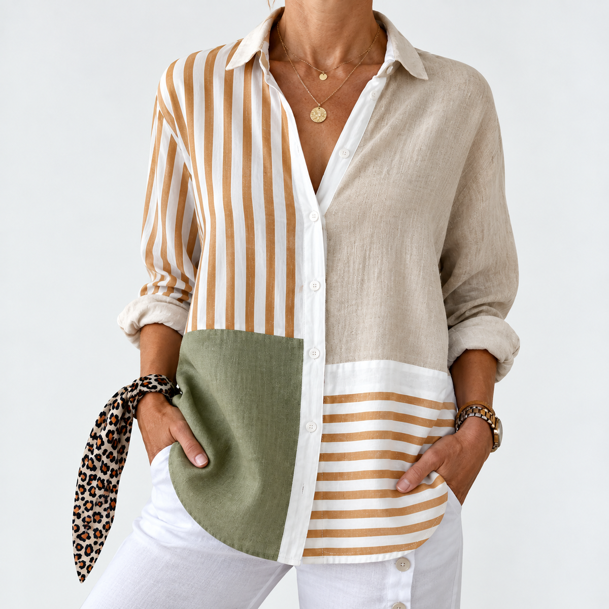Neutral patchwork stripe button-up blouse with long sleeves and collared neckline