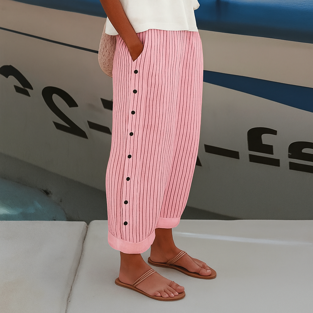 Pink-and-white vertical striped trousers with front buttons, wide leg
