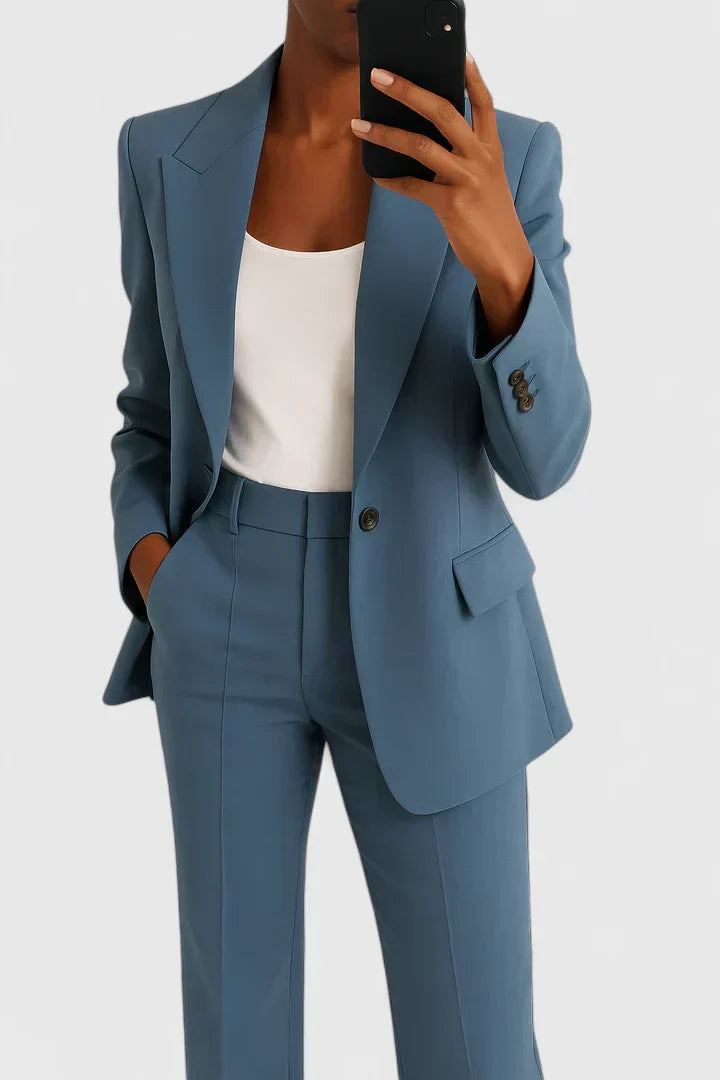 Blue two-piece blazer and trousers set with notched lapels and flap pockets