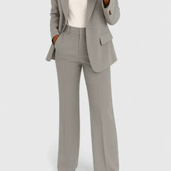 Gray two-piece blazer and trousers set with notched lapels and matching pants