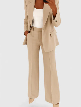 Beige two-piece blazer and trousers set with notched lapels and cuffed hems