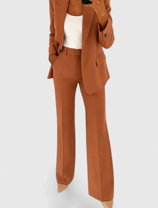Rust brown two-piece blazer and trousers set with notched lapels and flap pockets