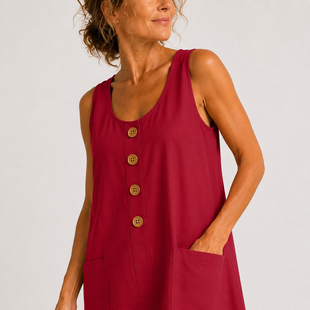 Close-up of red sleeveless cotton-linen dress with button front and side pocket