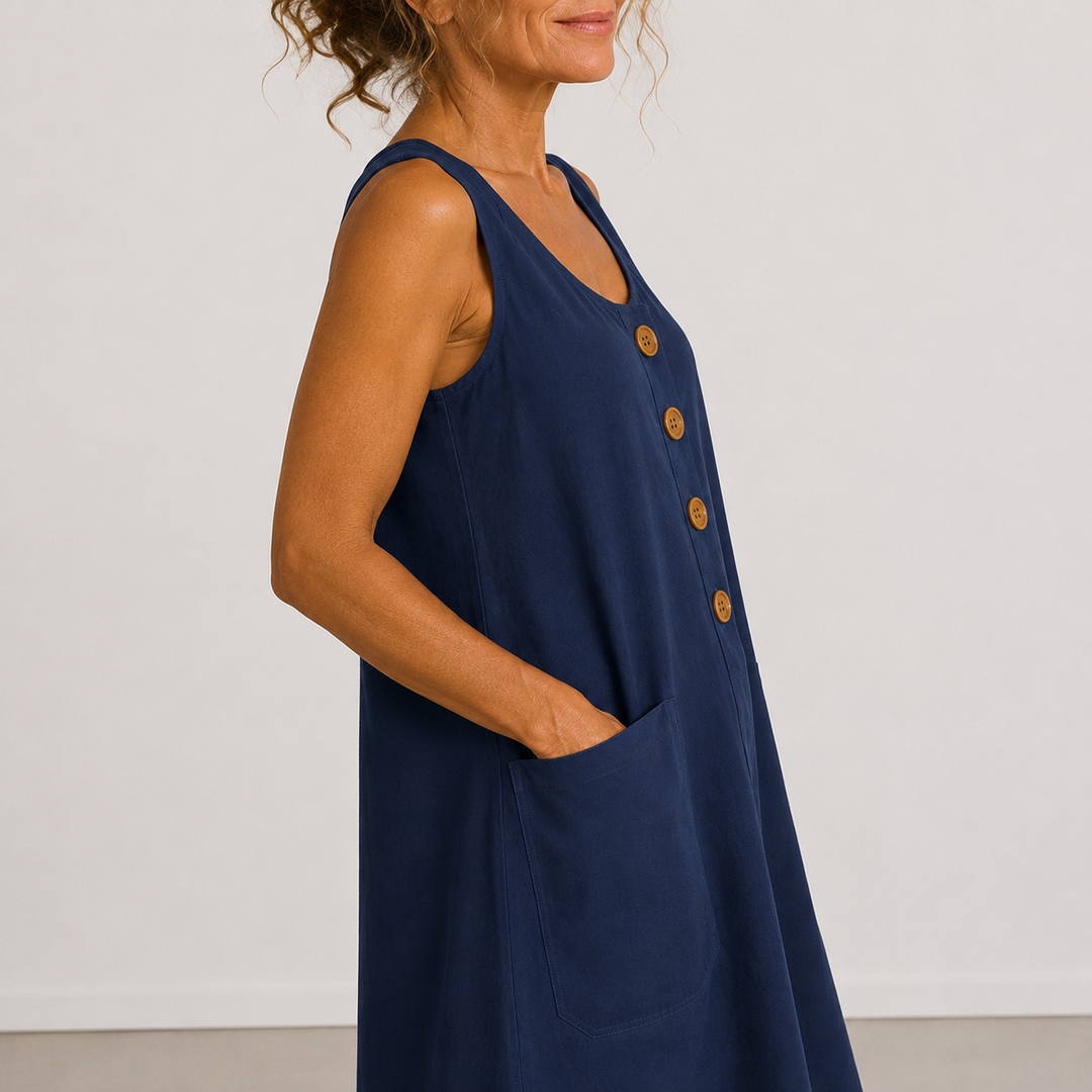 Close-up of blue sleeveless cotton-linen dress with button placket and side pocket