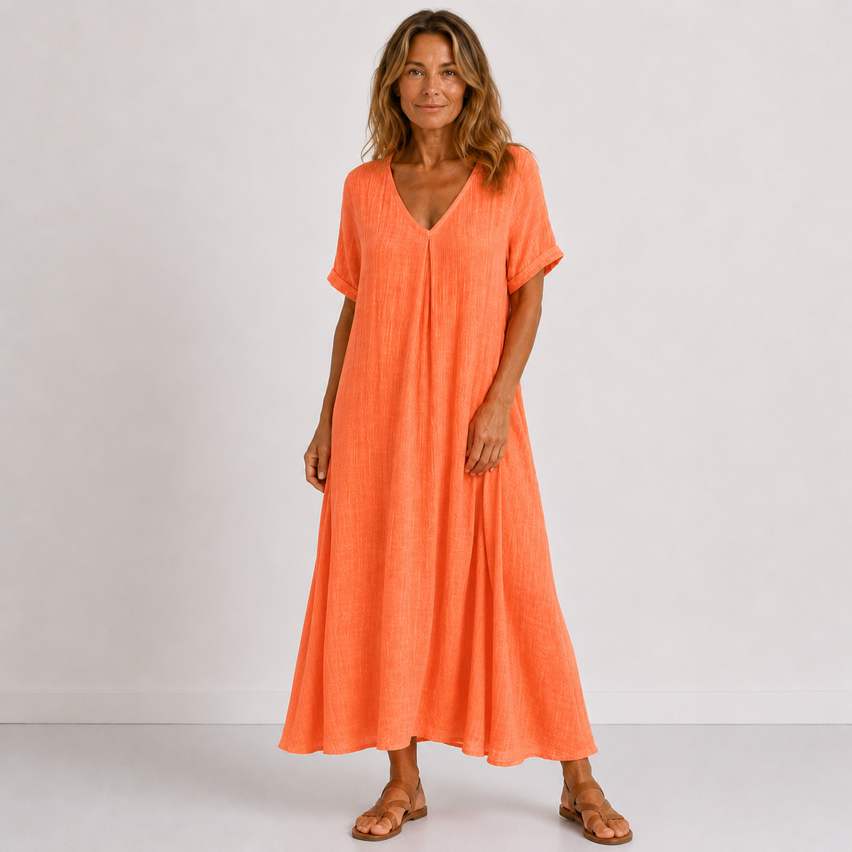 Orange V-neck midi dress with short sleeves, flowy A-line fit and breathable drape