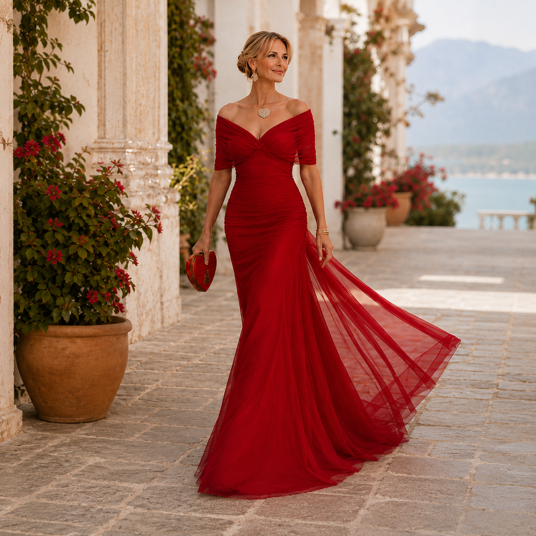 Off-shoulder maxi dress in red with off-shoulder neckline and flowing sheer hem