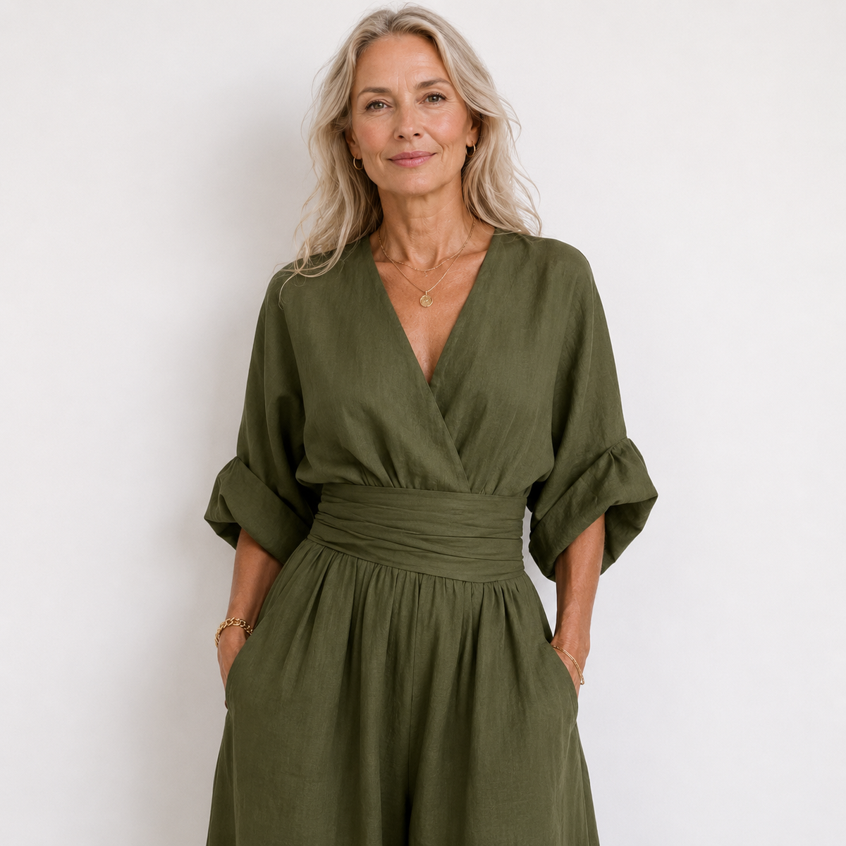 Women’s wide-leg jumpsuit in olive green with V-neck and waist tie