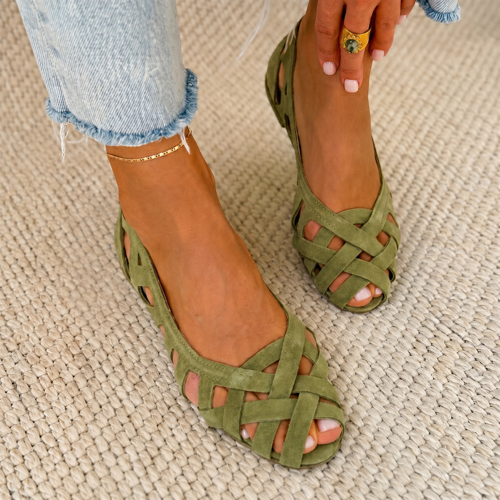 Green strappy comfort sandals with crisscross straps and open toe