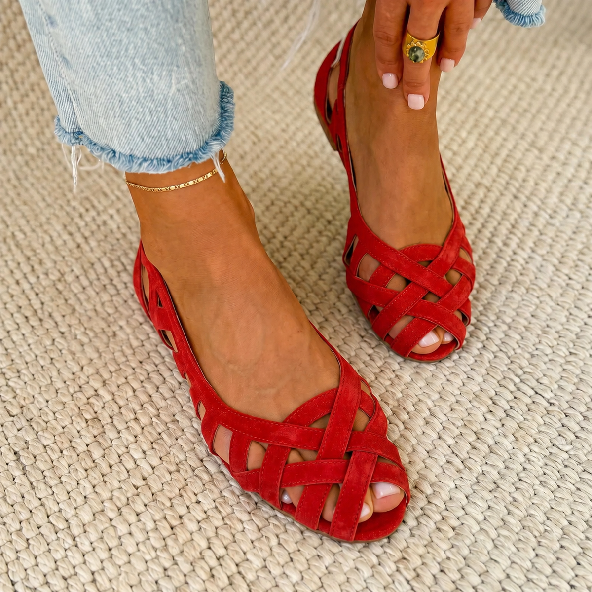 Red strappy comfort sandals with crisscross straps and open toe