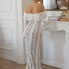 White lace maxi dress, off-shoulder neckline with long sleeves; open back detail.