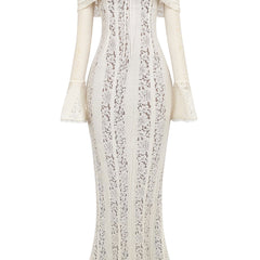 White lace maxi dress on white background: off-shoulder neckline, long sleeves, fitted skirt.