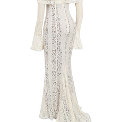White lace maxi dress flat lay: off-shoulder top with long sleeves; long flared skirt.