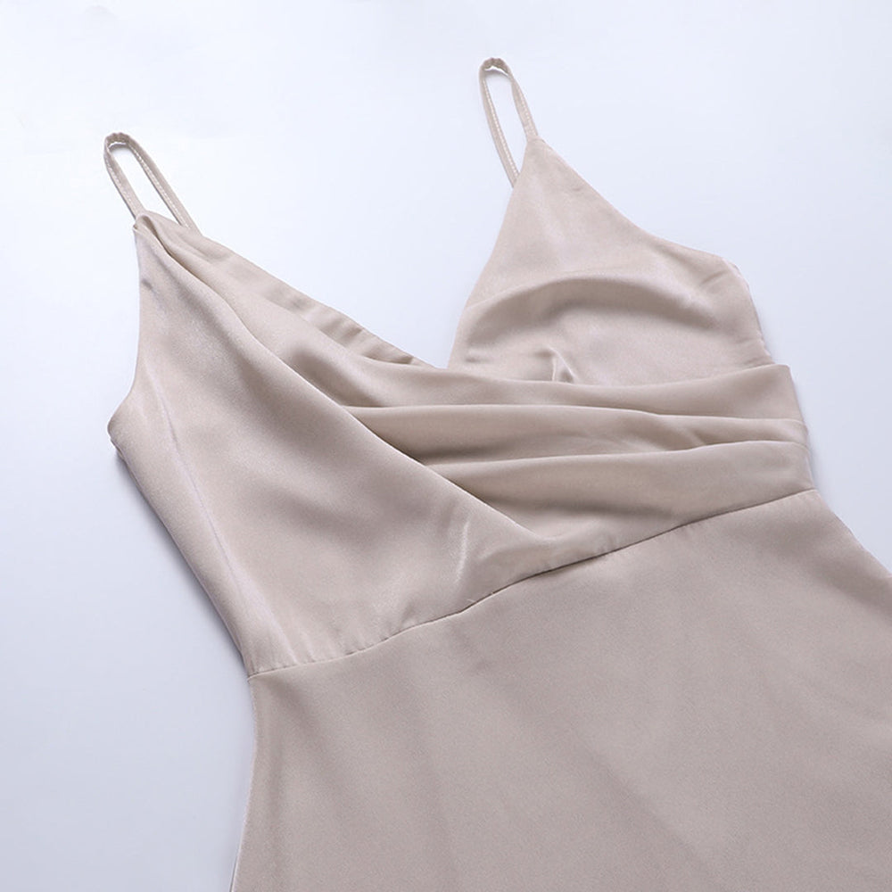 Beige satin sleeveless dress with crossed drape bodice and side slit