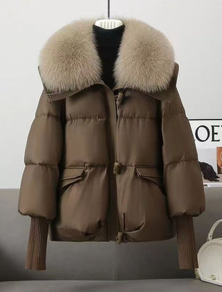 Brown puffer jacket with faux fur collar, zip front, flap pockets, ribbed knit cuffs
