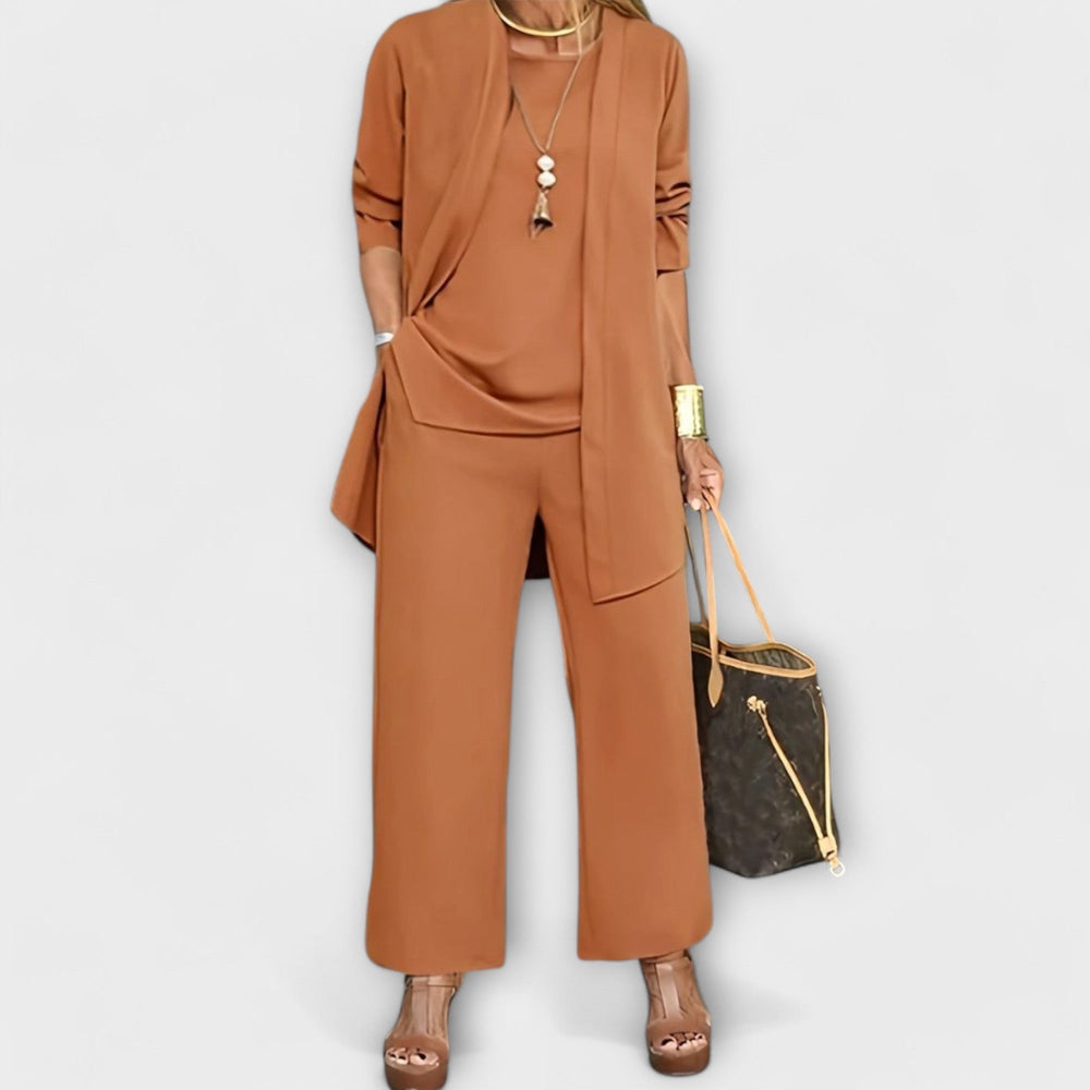 Tan three-piece outfit set with draped tunic, matching wide-leg pants, and side pocket