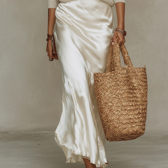 White knit V-neck top and satin maxi skirt two-piece set