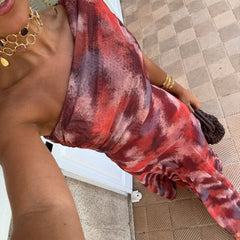 Mira off-shoulder long dress fabric close-up, red and mauve tie-dye drape