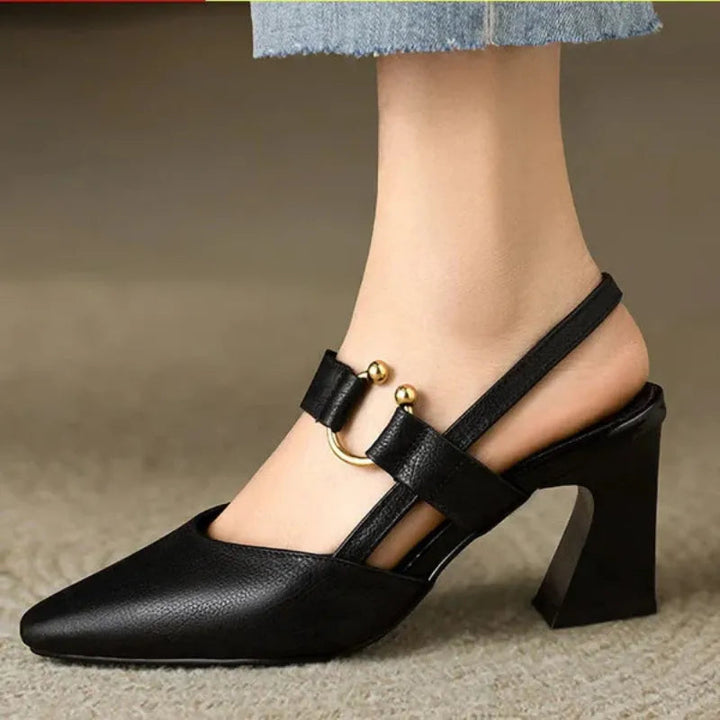 Black leather look heeled slingback with ankle strap and gold buckle detail
