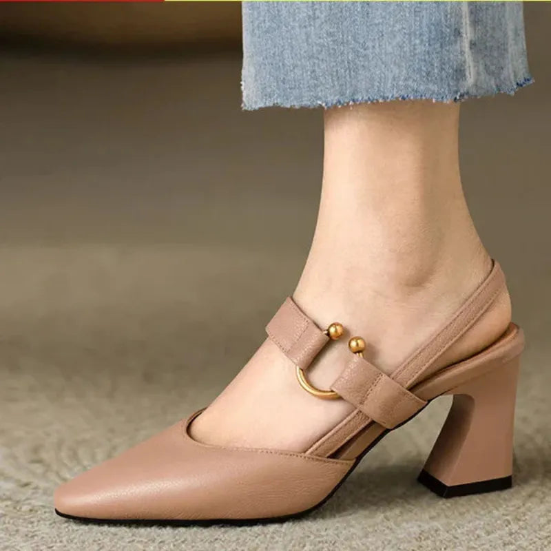 Brown leather look heeled slingback with ankle strap and gold buckle hardware