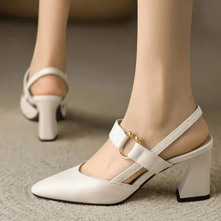 White leather look heeled slingback with ankle strap and gold buckle hardware